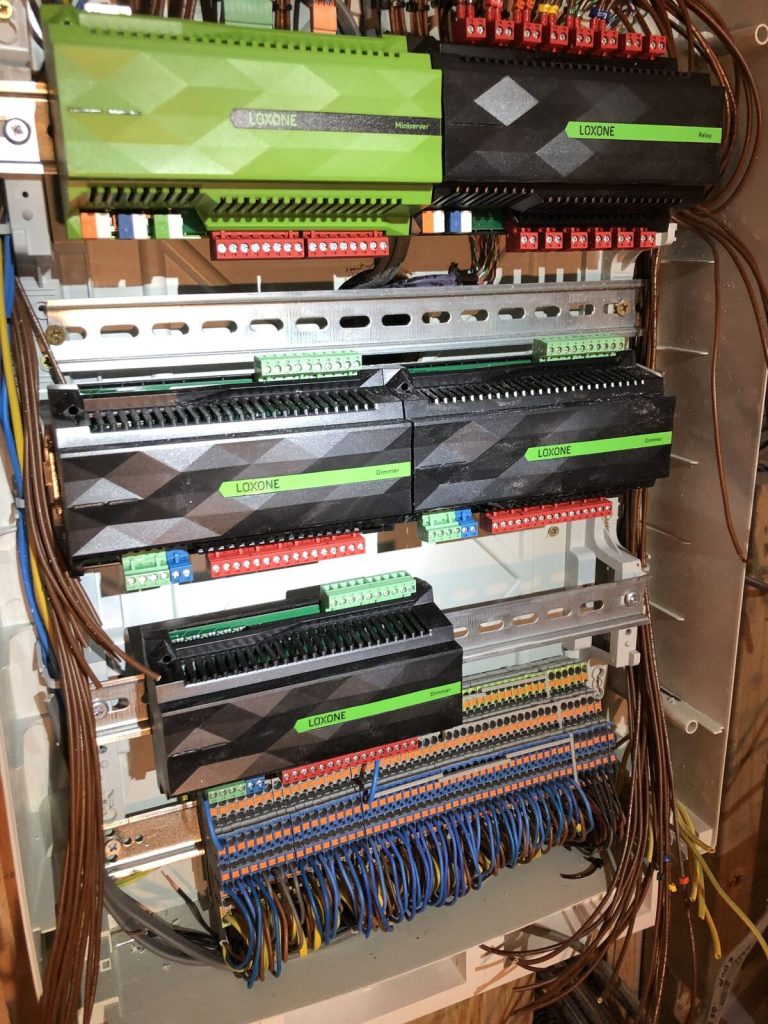 Neatly wired Loxone control cabinet for home and garden automation